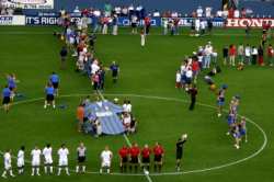 Pregame scene:  local youth soccer teams formed a bridge to welcome the players, refs and cheerleaders