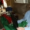 Dad is thrilled to open a specail gift from his Mom...