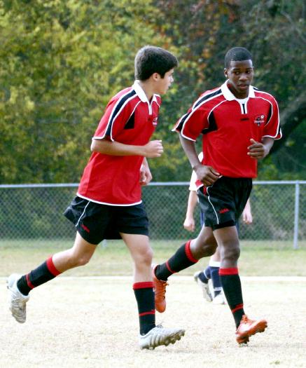 Ben and Jordan celebrate Ben's goal