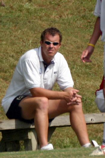 Coach watches from the sidelines