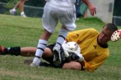 Billy makes a save, and then collapses with heat stroke