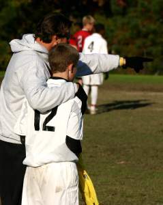 Coach gives Cam some pointers
