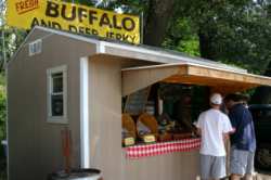 Later on, we headed up to Estes Park, and stopped on the way at a roadside jerky stand. John had Elk!