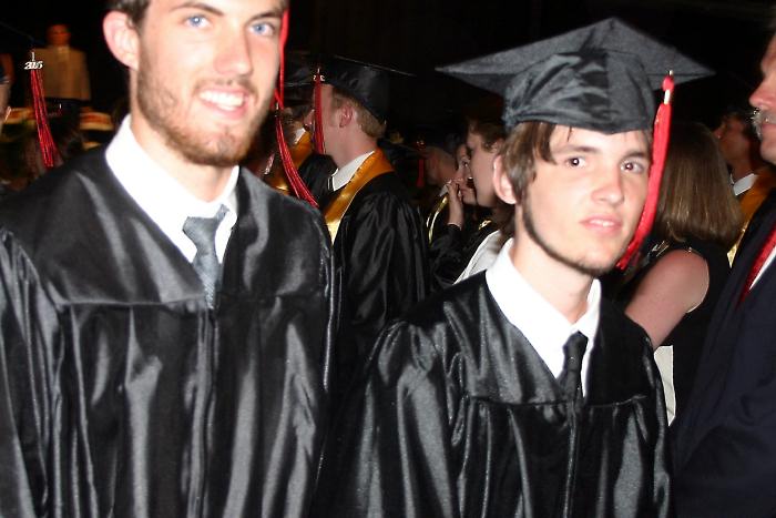 Graduates march out - with the tassles on the other side now