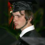 Drew walks to the stage to get his diploma