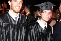 Graduates march out - with the tassles on the other side now